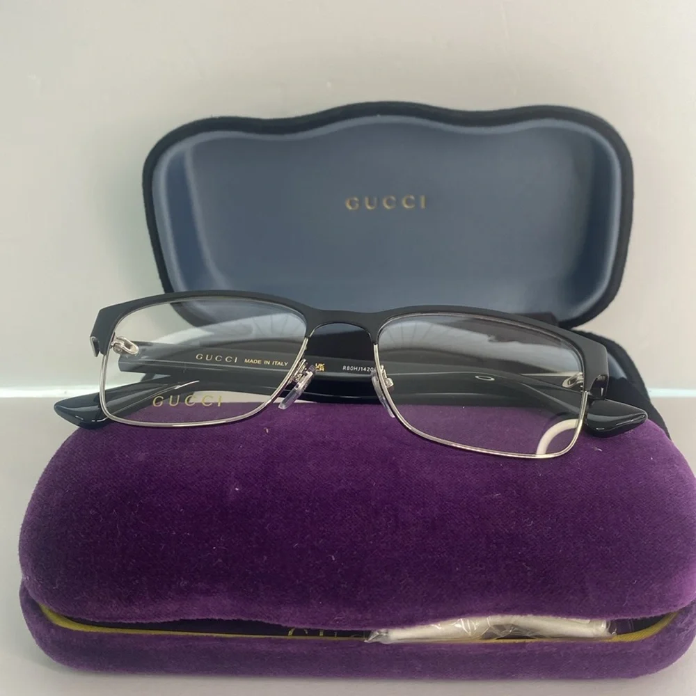 GUCCI GG0750O 001 square optical matte black and silver with shiny black frame.